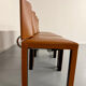 4 camel leather chairs, postmodern design by Paolo Piva for B&B Italia Arcadia.