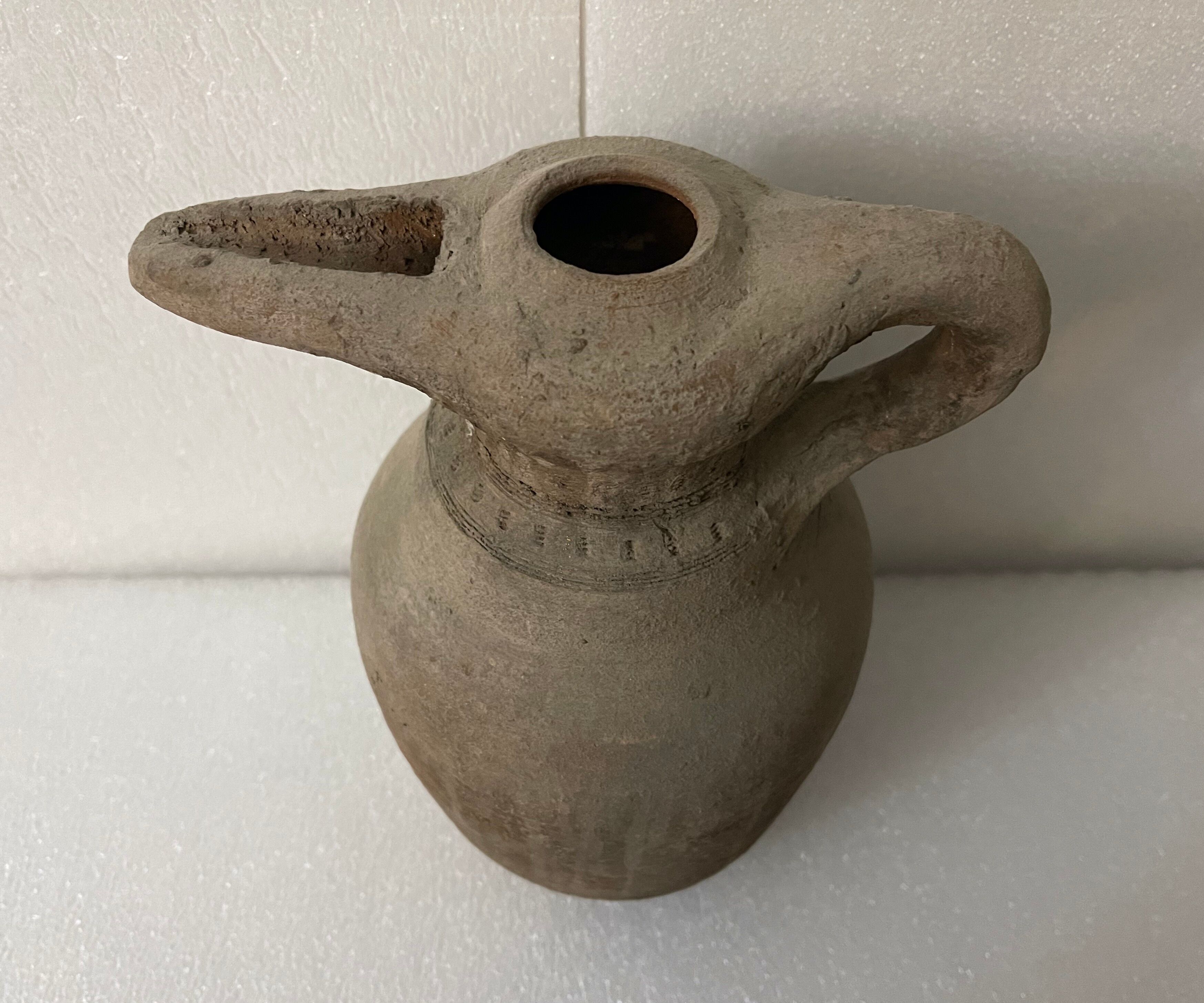 Zoomorphic pitcher with a beaked ancient Islamic ceramic birds