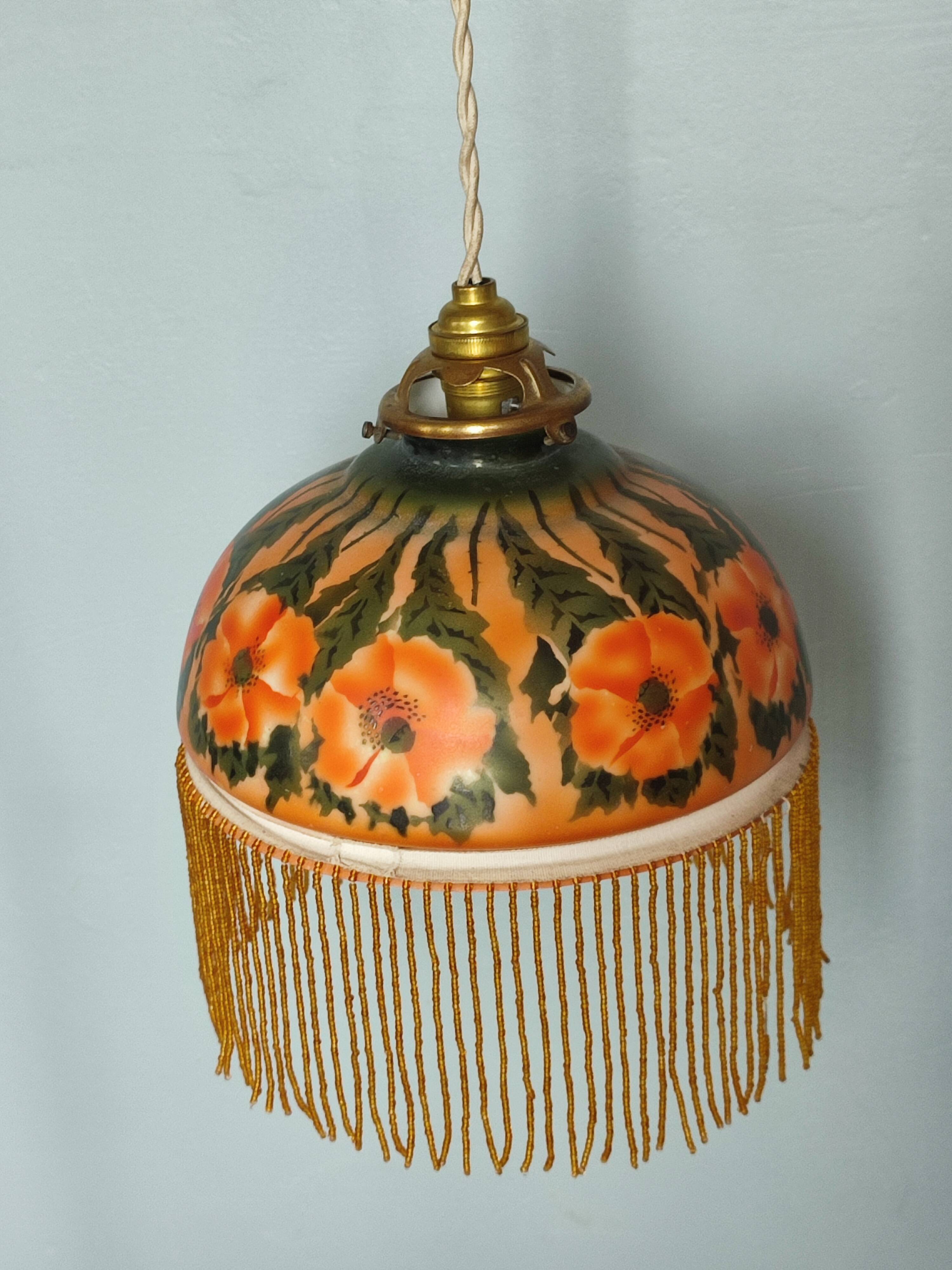 Old opaline and its tassels hanging lamp