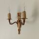 Vintage wall sconce in gilded brass, Empire style.