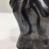 Vase with intertwined hands