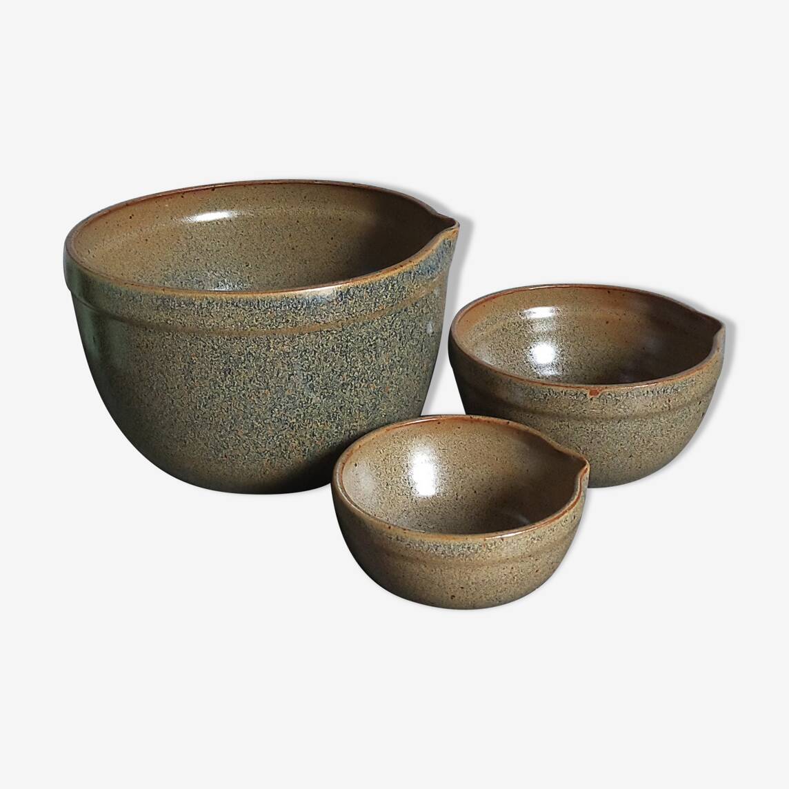 Three nesting pottery salad bowls in glazed stoneware