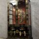 20th century China: Pretty bookcase in lacquer, hard stone and mother-of-pearl with three glazed sides