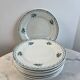 Set of 12 antique flat plates — Céranord pottery, model