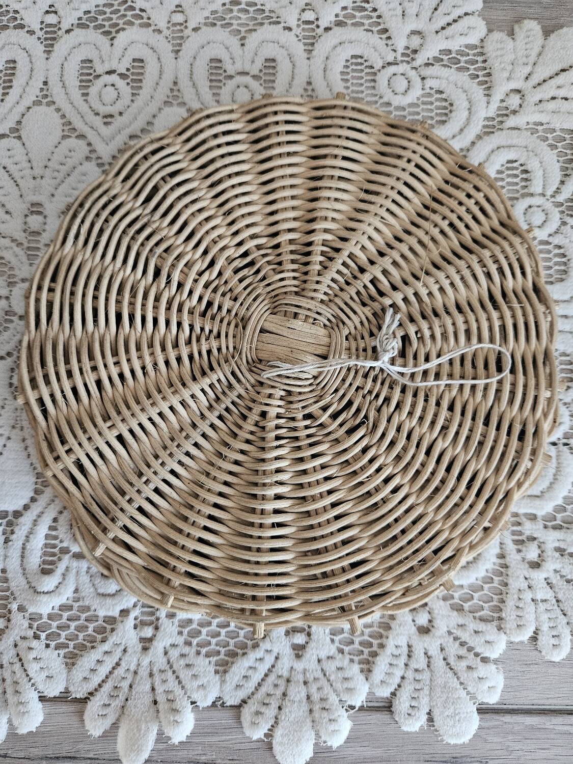 Old small round wicker mirror