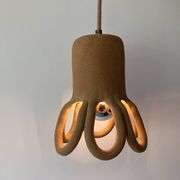 Suspension in the shape of a flower made of handcrafted ceramic, raw red stoneware mid-century.