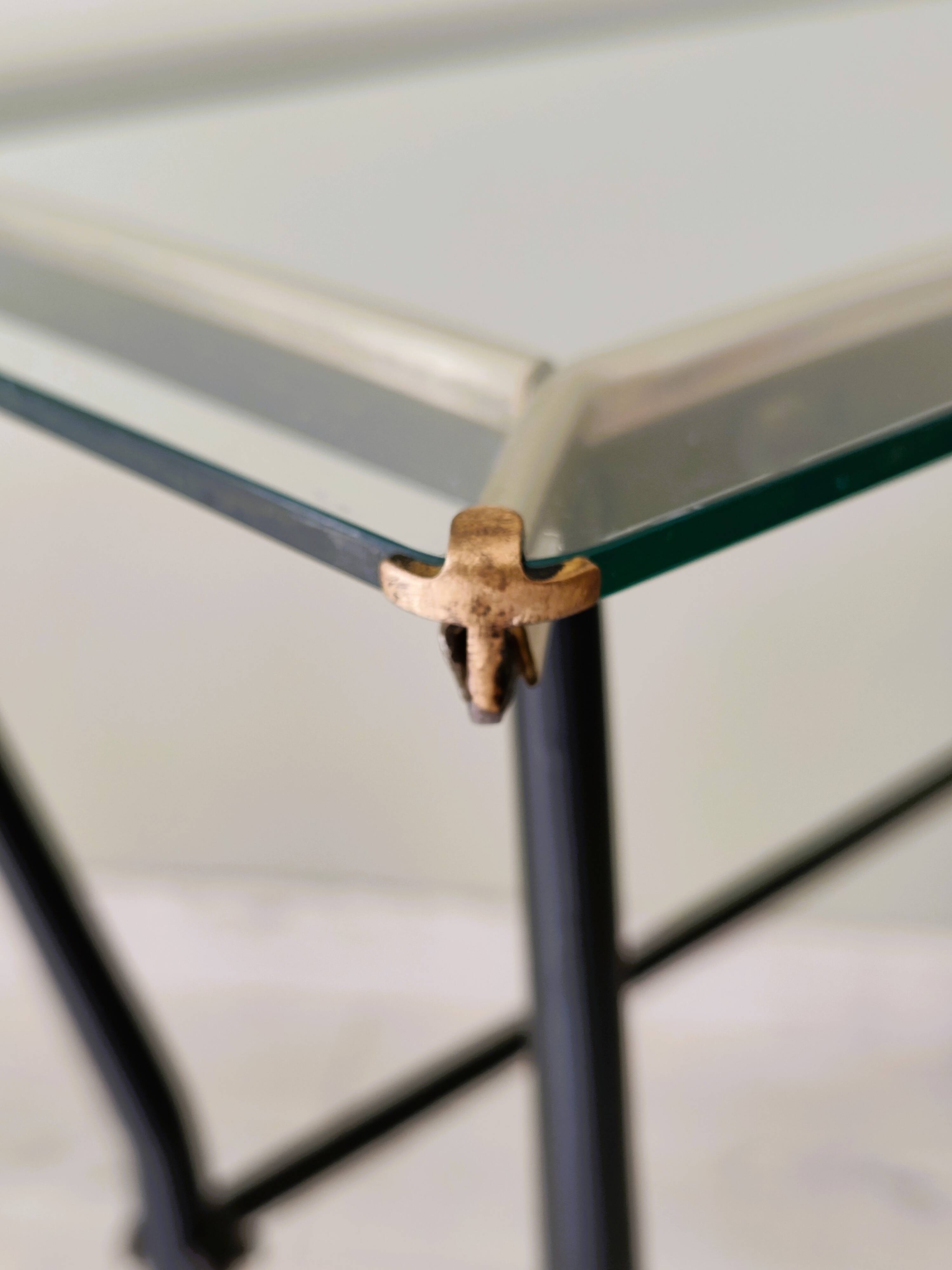 Antique side table made of metal and glass