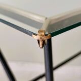 Antique side table made of metal and glass