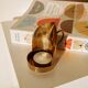 Brass tea light holder with handle
