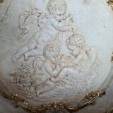 wall panel with angels in stucco and weathered wood