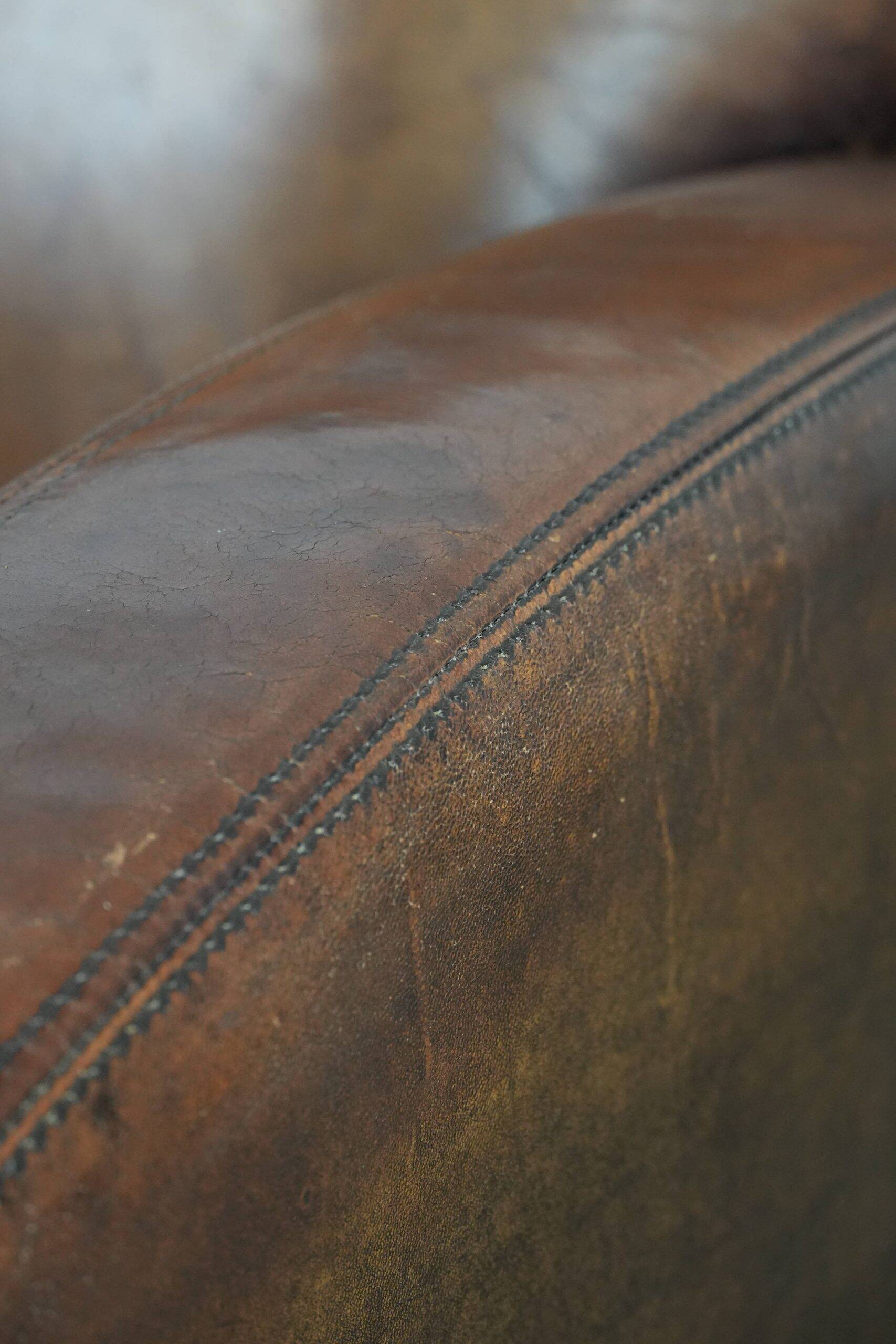 Characterful vintage sheepskin leather armchair with beautiful colours