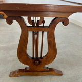 Old rectangular wood coffee table with lyre side posts
