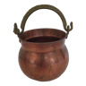 Copper cauldron with golden handle
