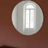 Large vintage chiseled round mirror