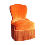 Velvet toad armchair and orange fringes