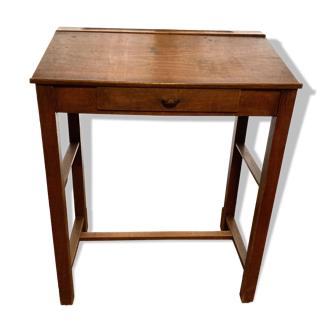 Inclined school desk.