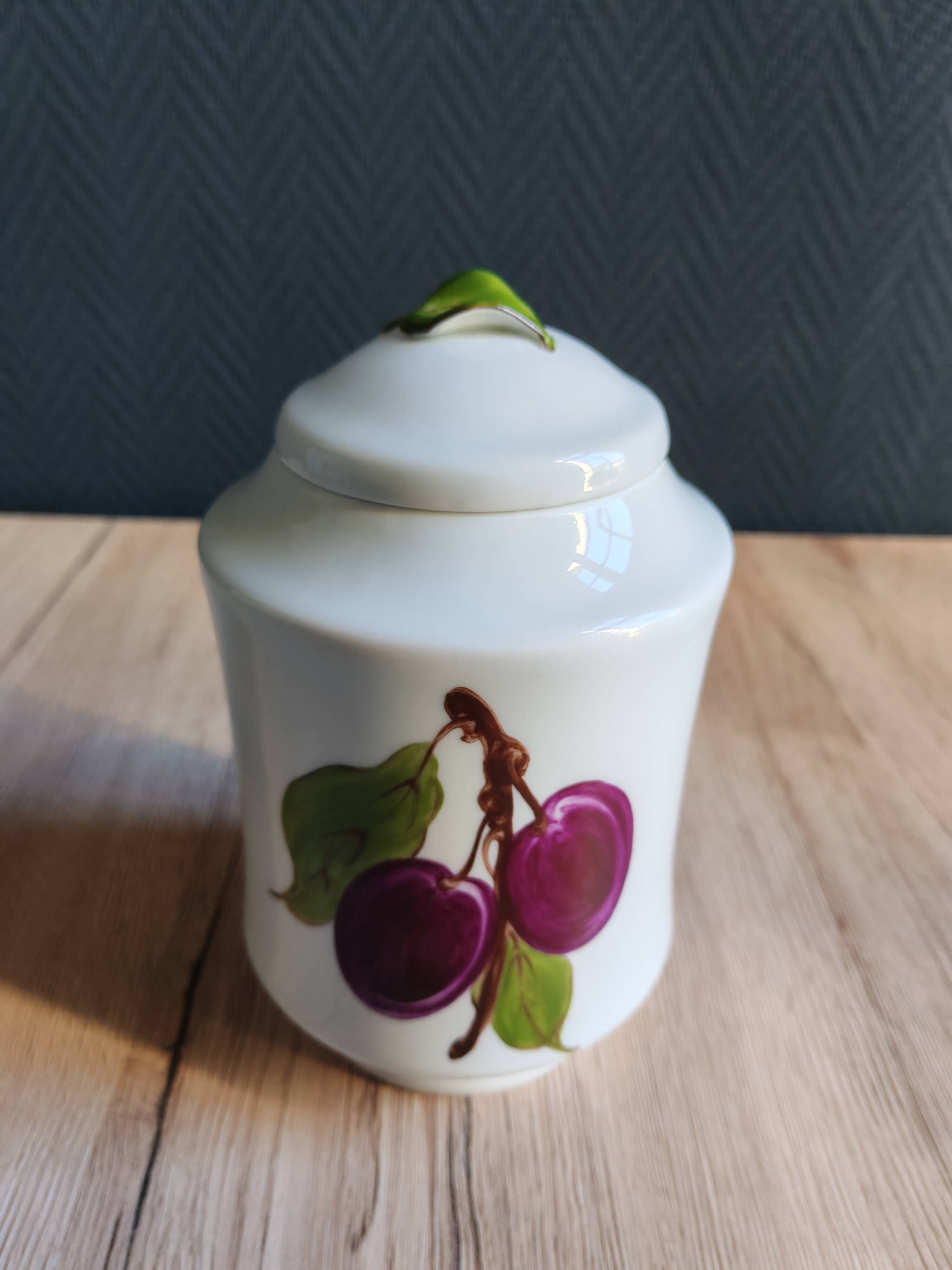 Porcelain jam pot with hand-painted plum design, signed sweet jar.