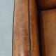 Art Deco sheep leather armchair with a lot of character