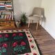 Very Old Romanian floral handwoven carpet made in wool, bohemian design