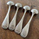 4 teaspoons in silver metal