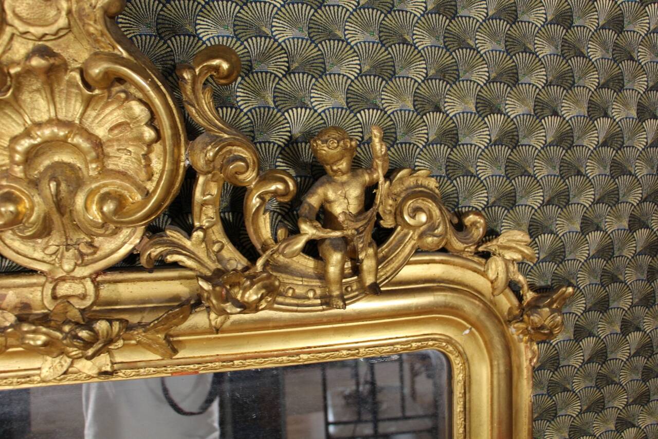Louis Philippe mirror decorated with Putti