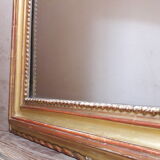 Golden mirror with pediment XIXth