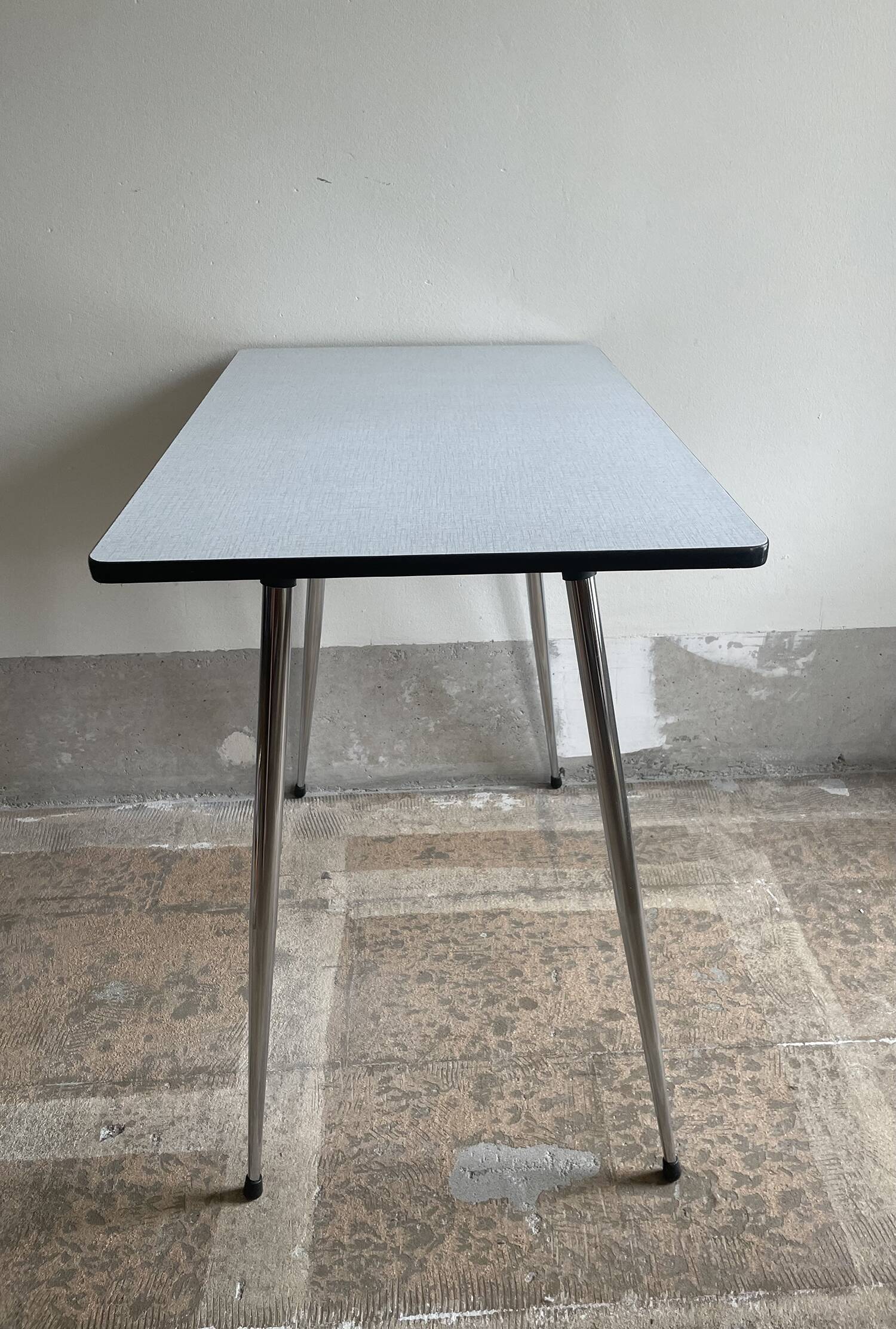 Small, gray formica table