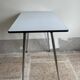 Small, gray formica table