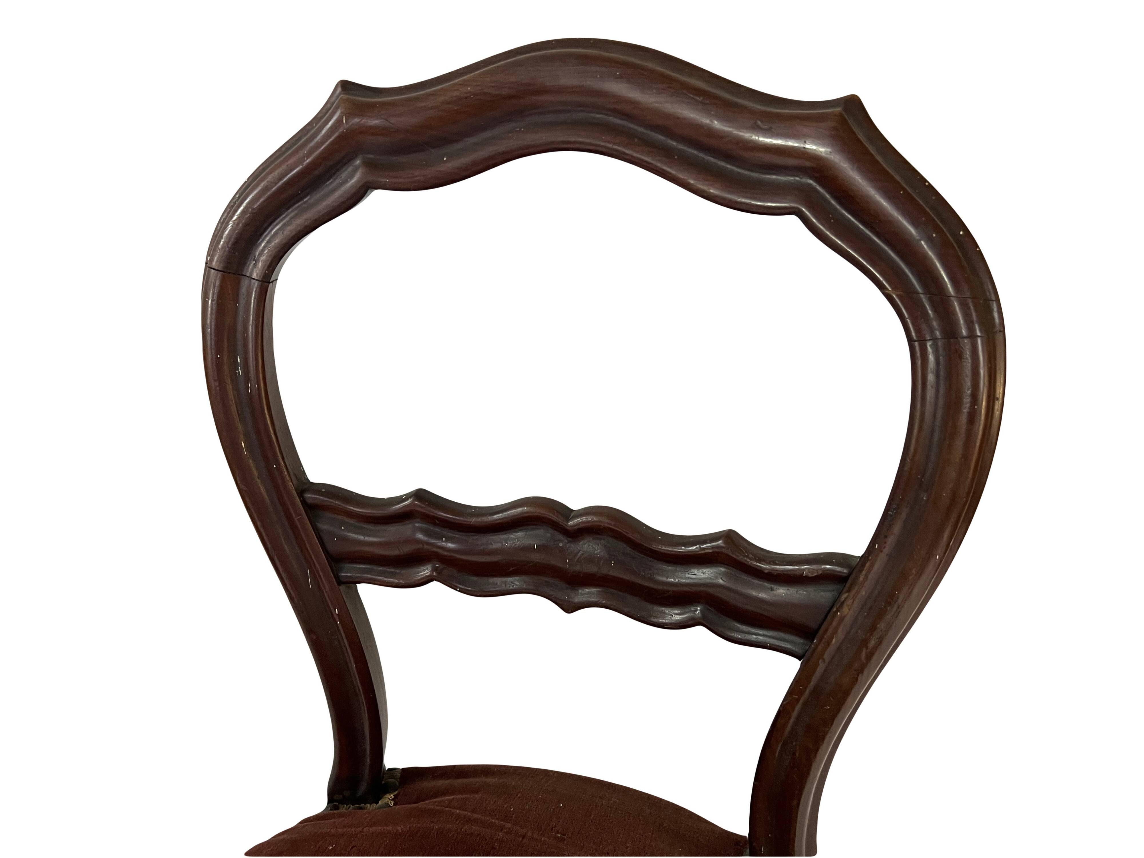Pair of Louis Philippe period chairs in solid mahogany