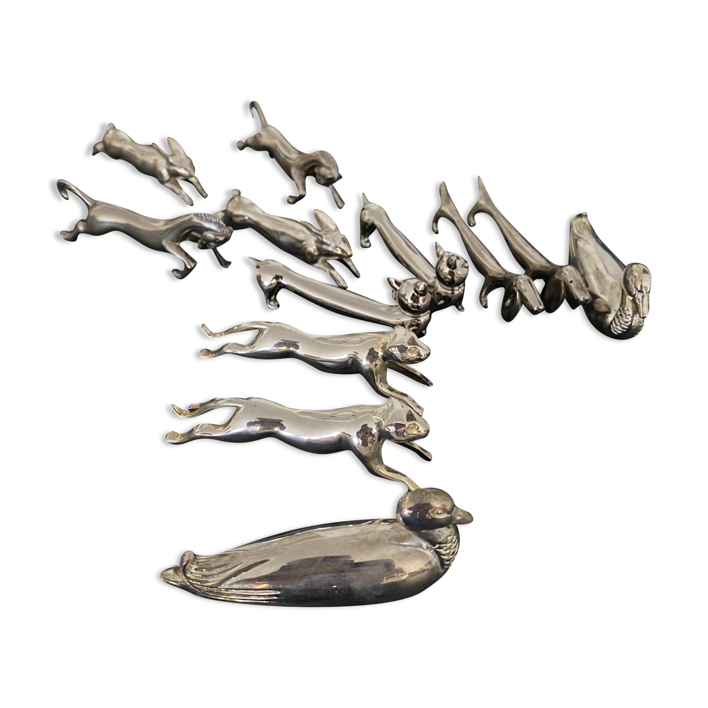 12 knife holders form various metal animals