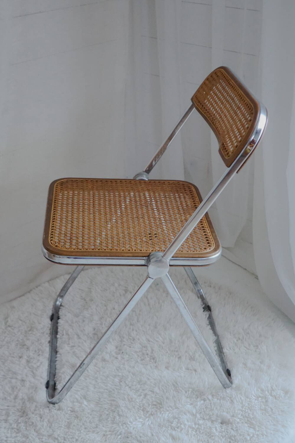 Vintage design cane folding chair: Giancarlo Piretti