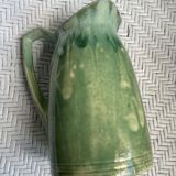 Turquoise green enamelled ceramic pitcher