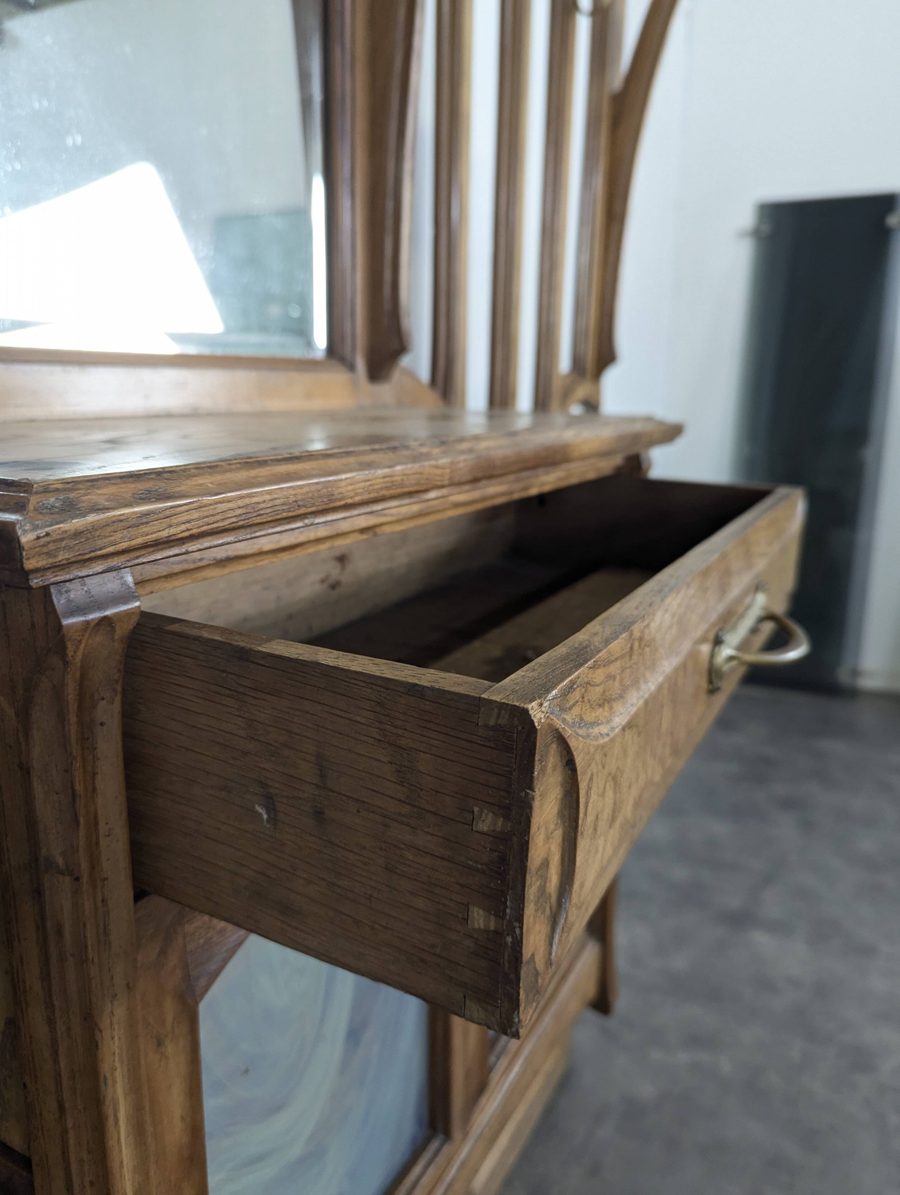 Large Art Nouveau cloakroom in the style of Van de Velde.