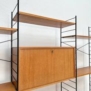 1960s vintage freestanding teak shelving system by WHB