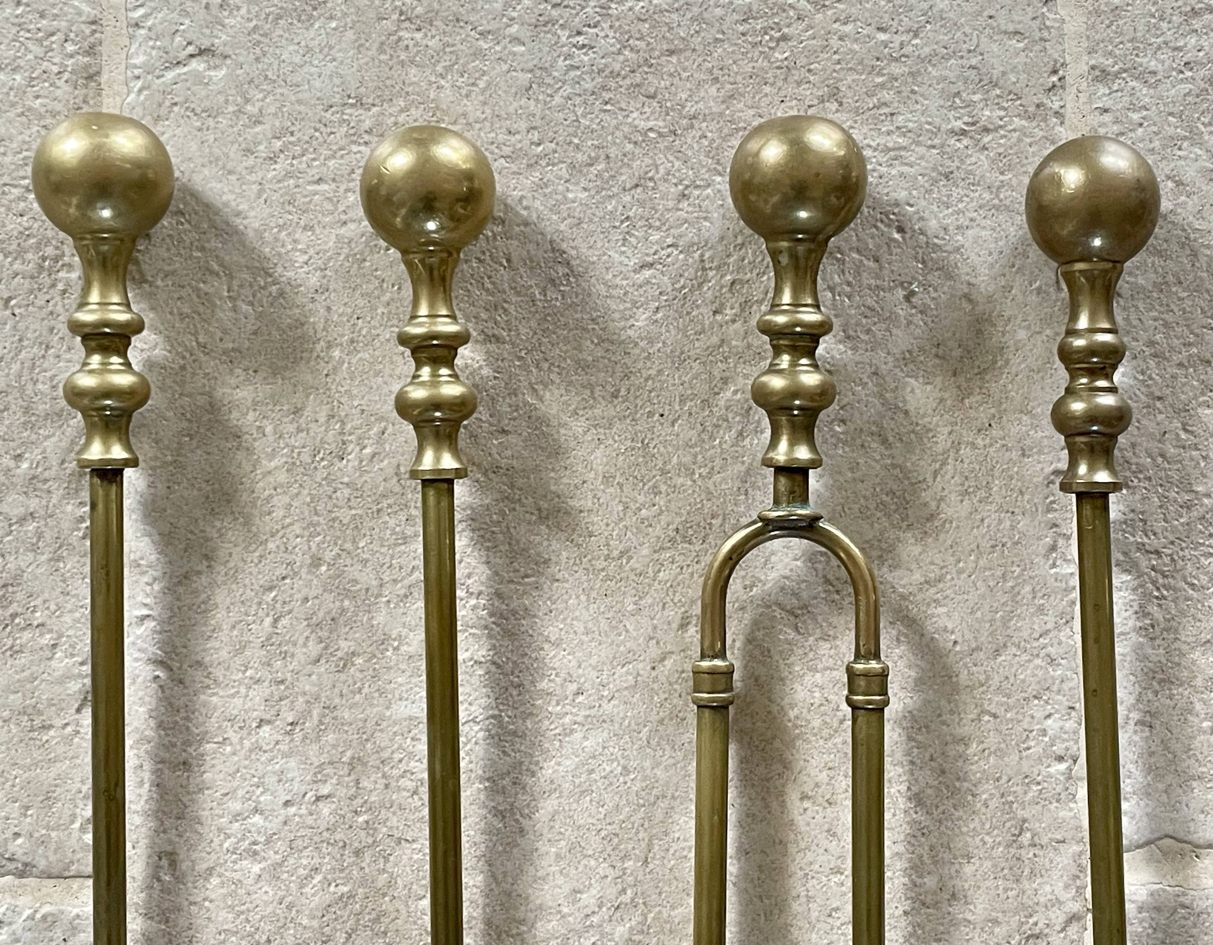 Brass fireplace accessory set with vintage stand