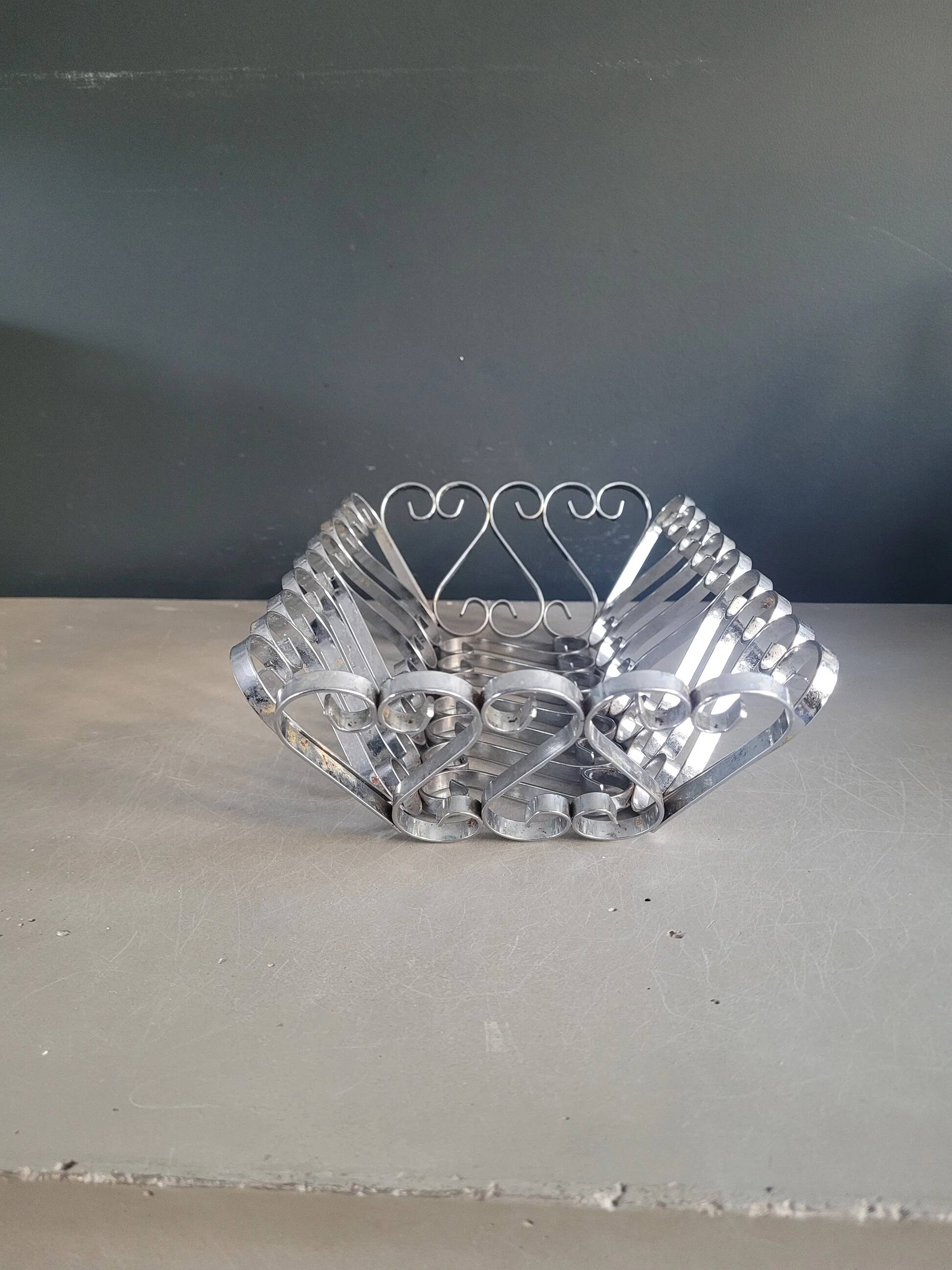 Vintage bread basket in forged chrome-plated metal