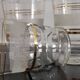 8 glasses with white granite band and gold edging from the 1950s