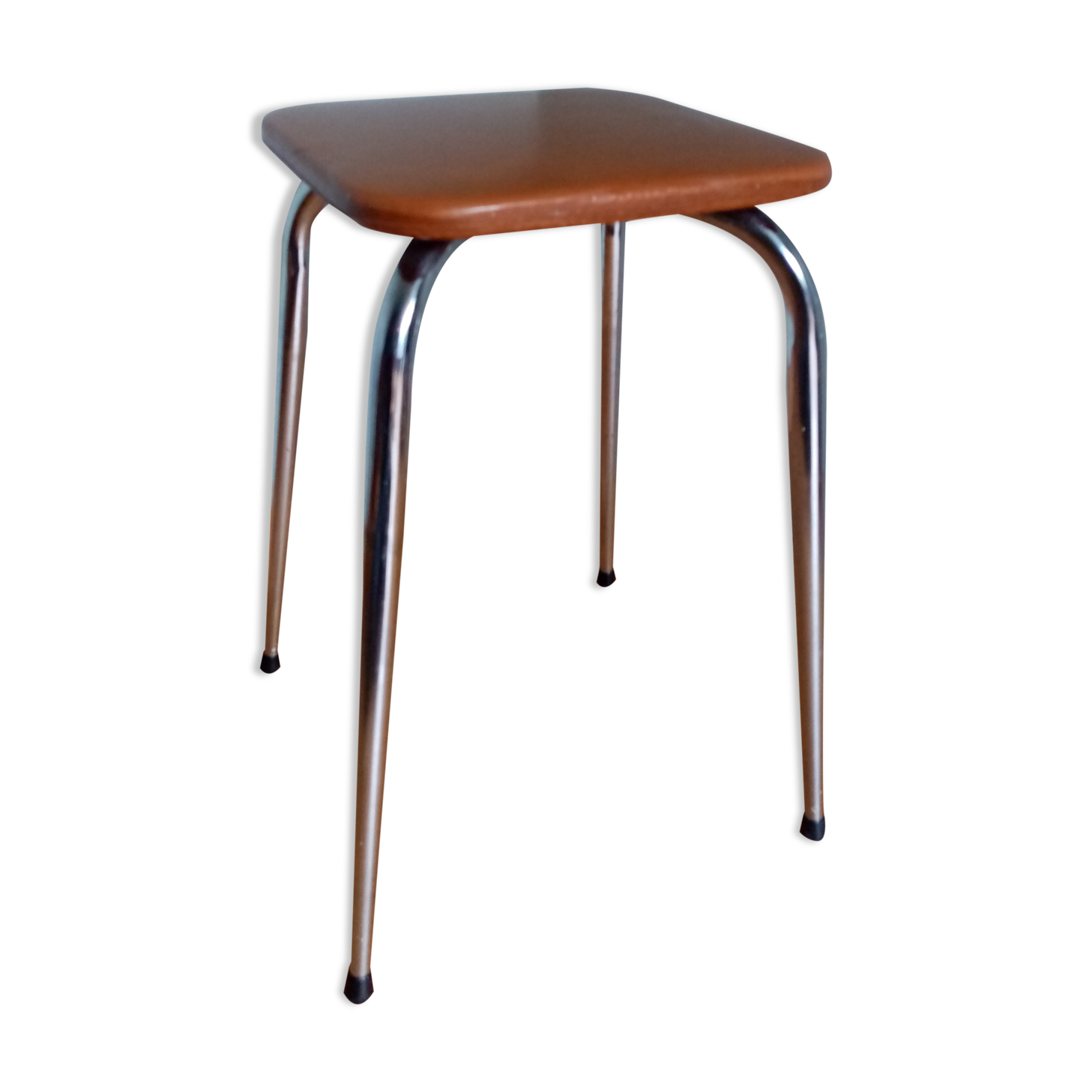 Caramel skaï stool and tapered feet in chrome metal