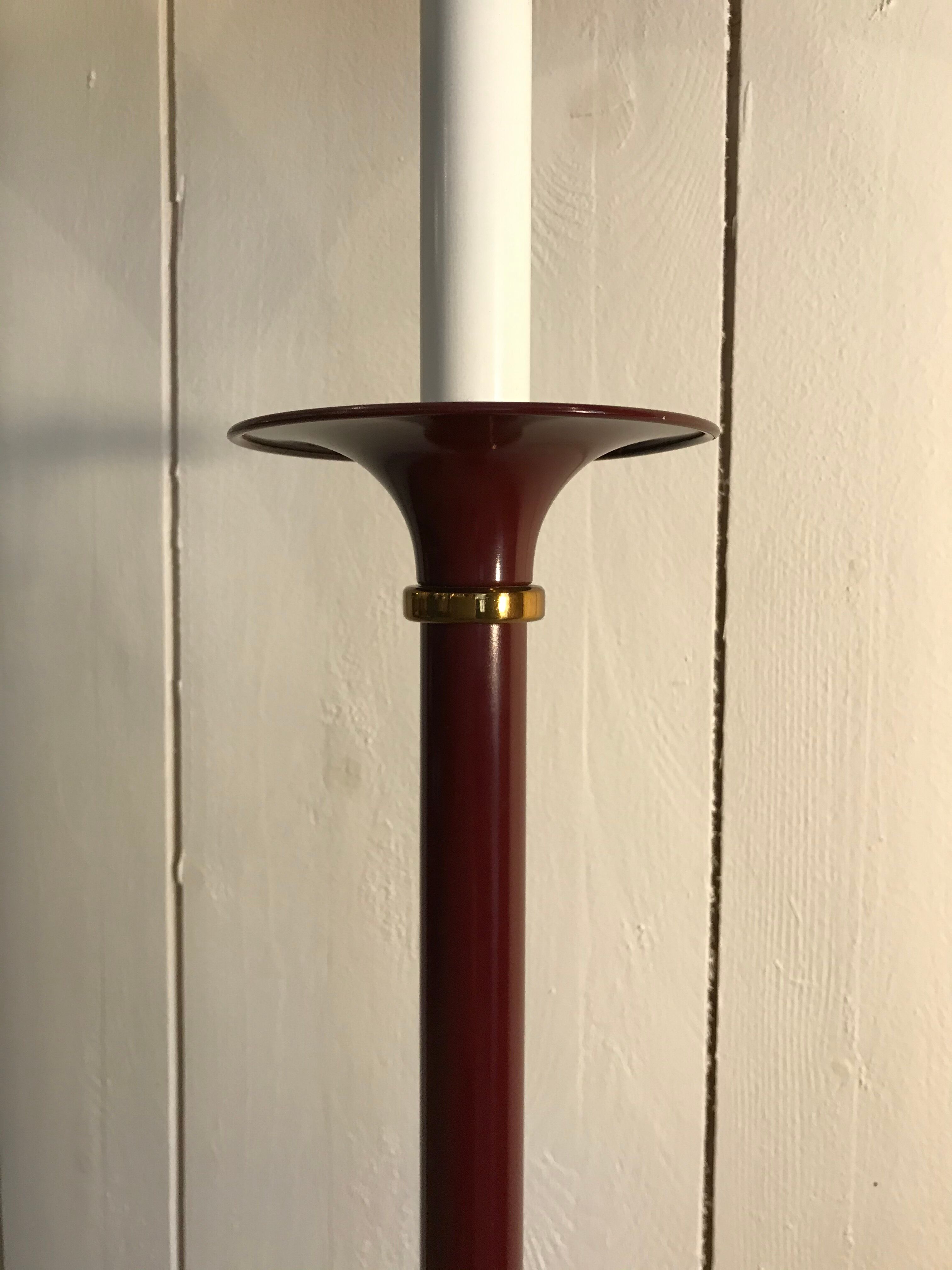 Pair of red enamelled metal floor lamps