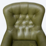 Swivel armchair in olive green leather 1970s
