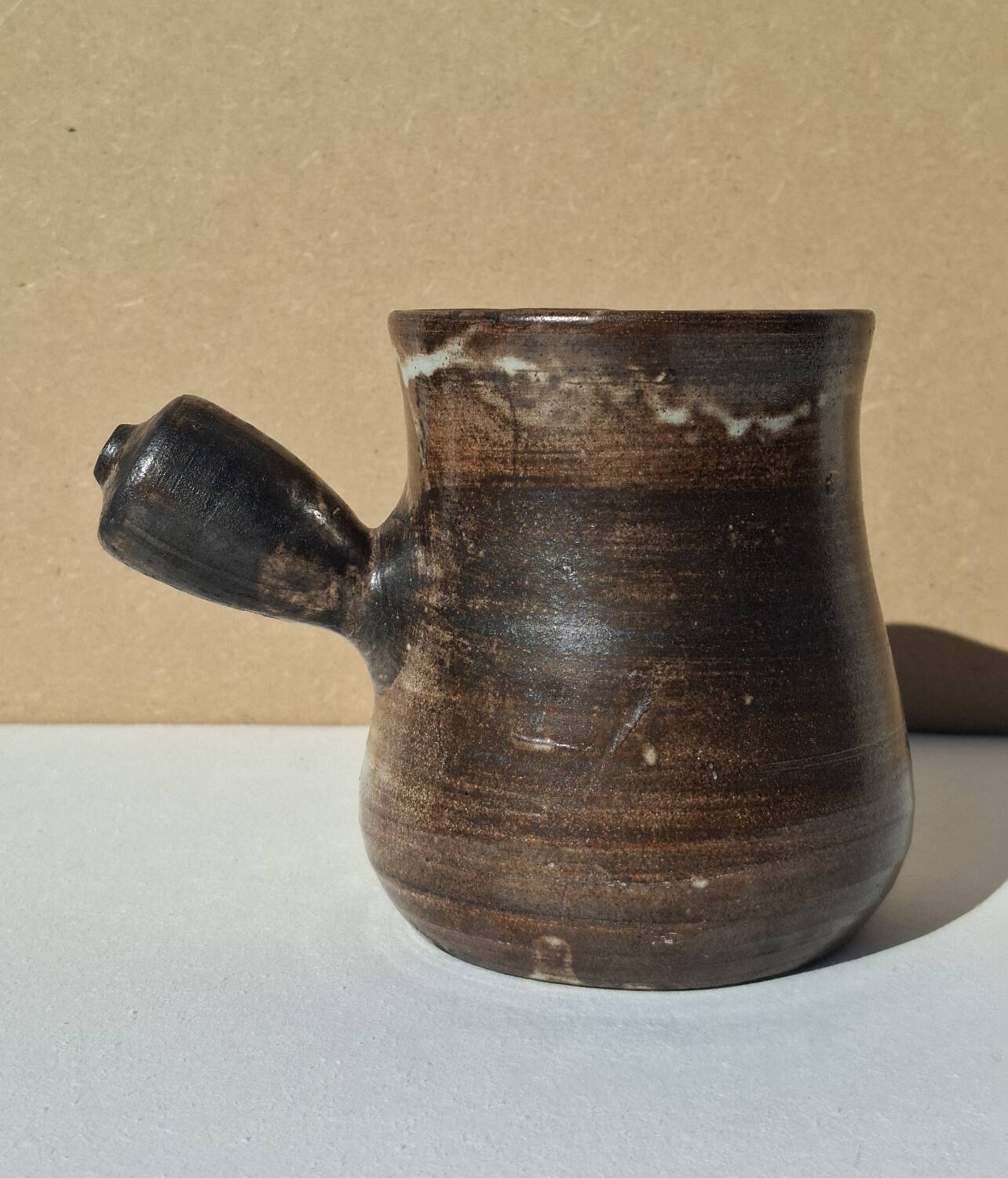 Stoneware pitcher signed by Jacques Pouchain.