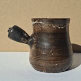 Stoneware pitcher signed by Jacques Pouchain.