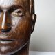 Monoxyle wood sculpture of a man's head, vintage craftsmanship from the 1950s.