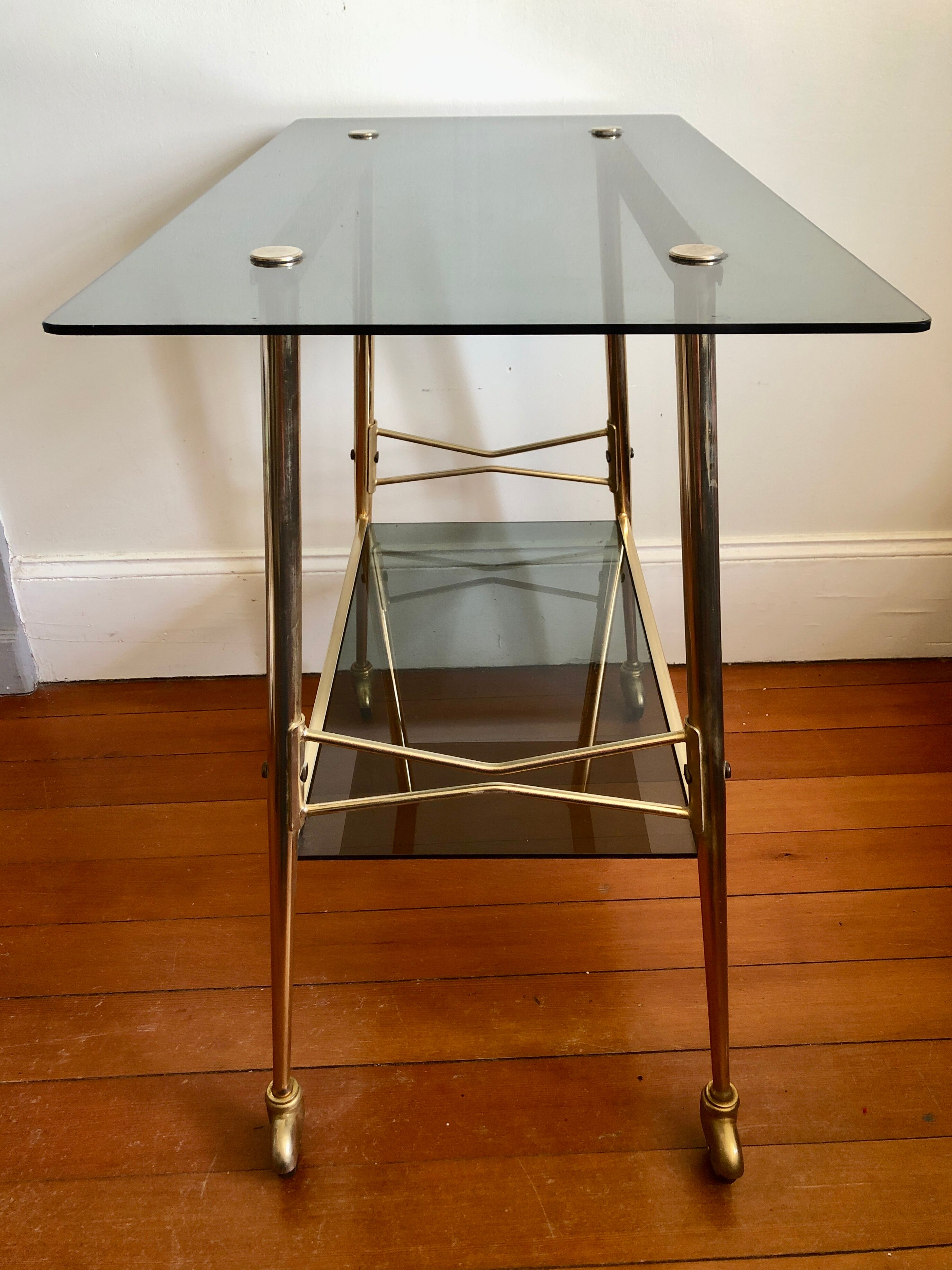 Smoked glass and gilded brass trolley