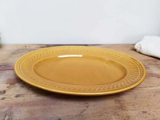 Serving dish in mustard gien earthenware