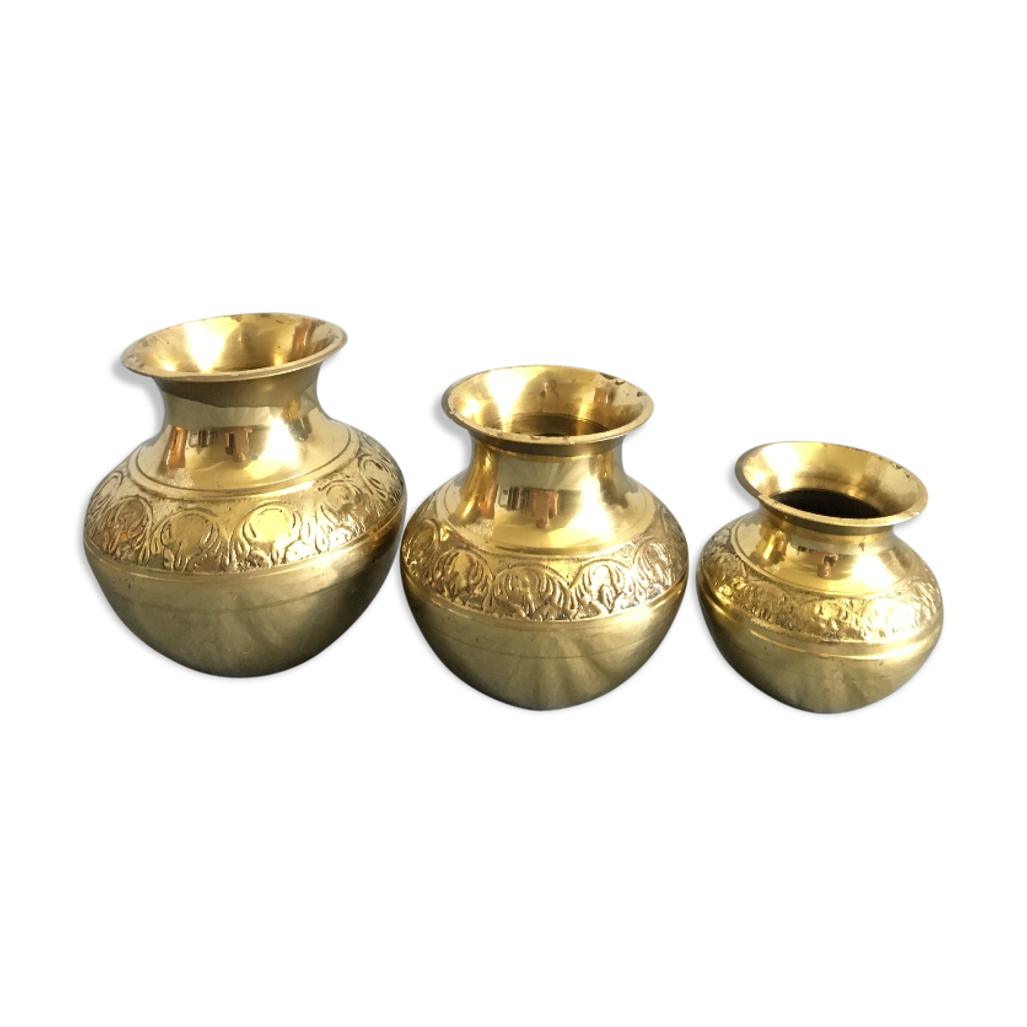 Three small brass vases