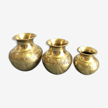 Three small brass vases