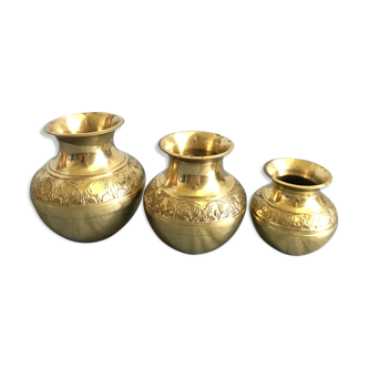 Three small brass vases