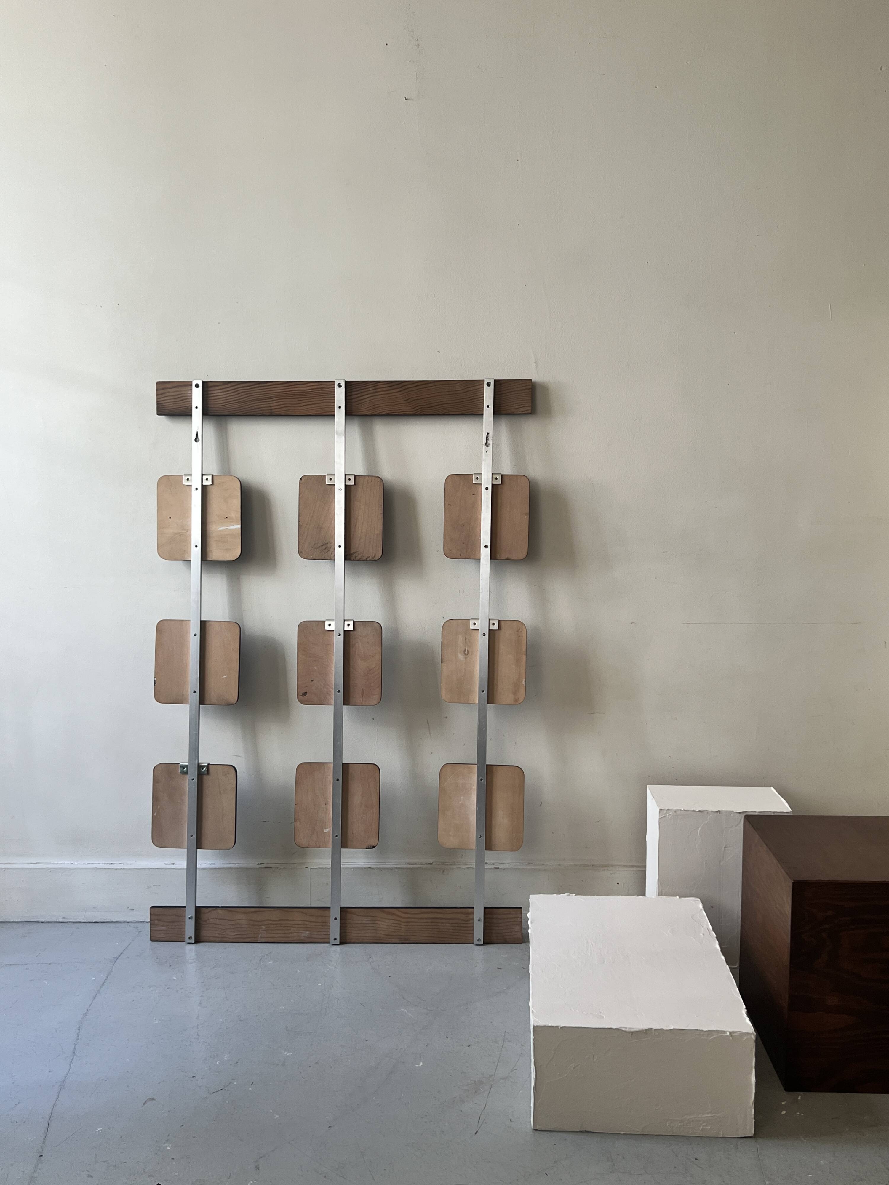 Large modernist wall coat rack in wood and metal, 1970s design.