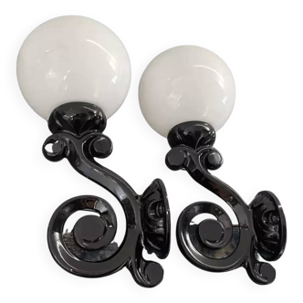 Pair of vintage enameled cast iron wall sconces